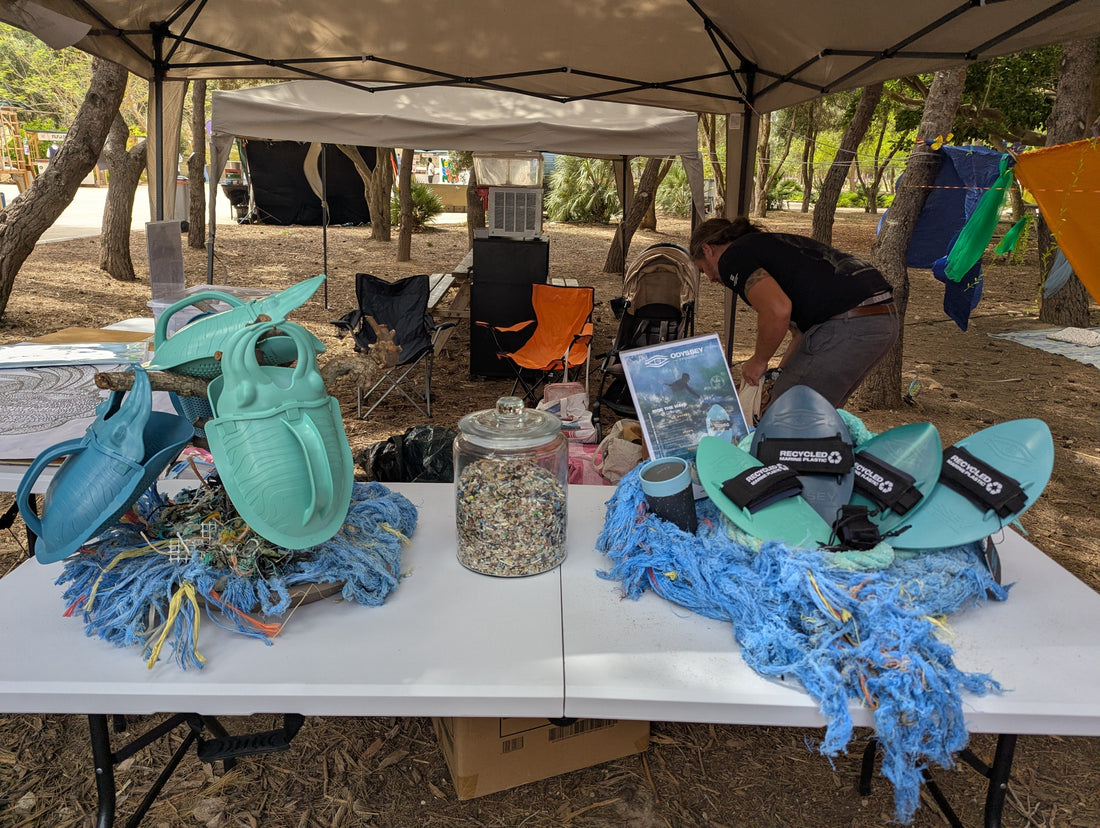 Odyssey Innovation team showcasing recycled ocean plastic products and Scuttle the Cuttle at VeganFest Malta 2026