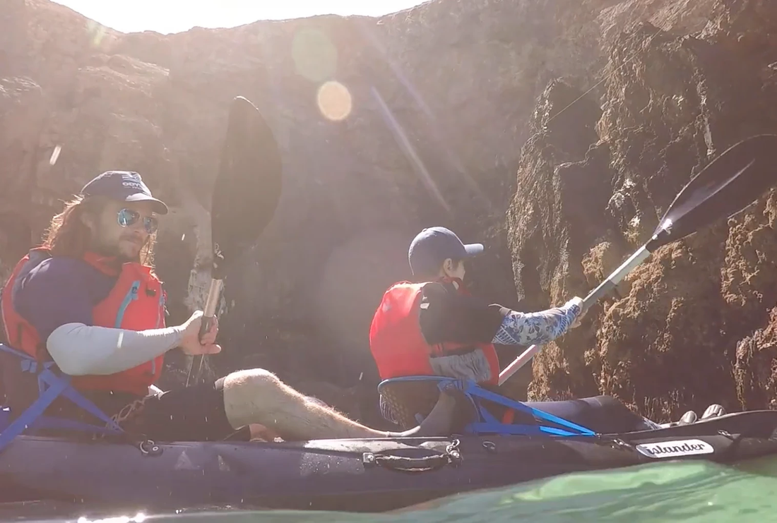 Odyssey Innovation Paddle for Plastic campaign — kayakers collecting marine plastic and fishing nets from inaccessible coves and beaches